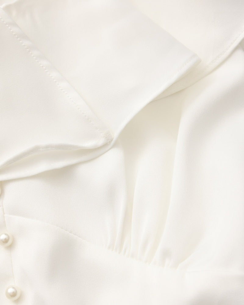 Robe midi à volants et boutons nacrés