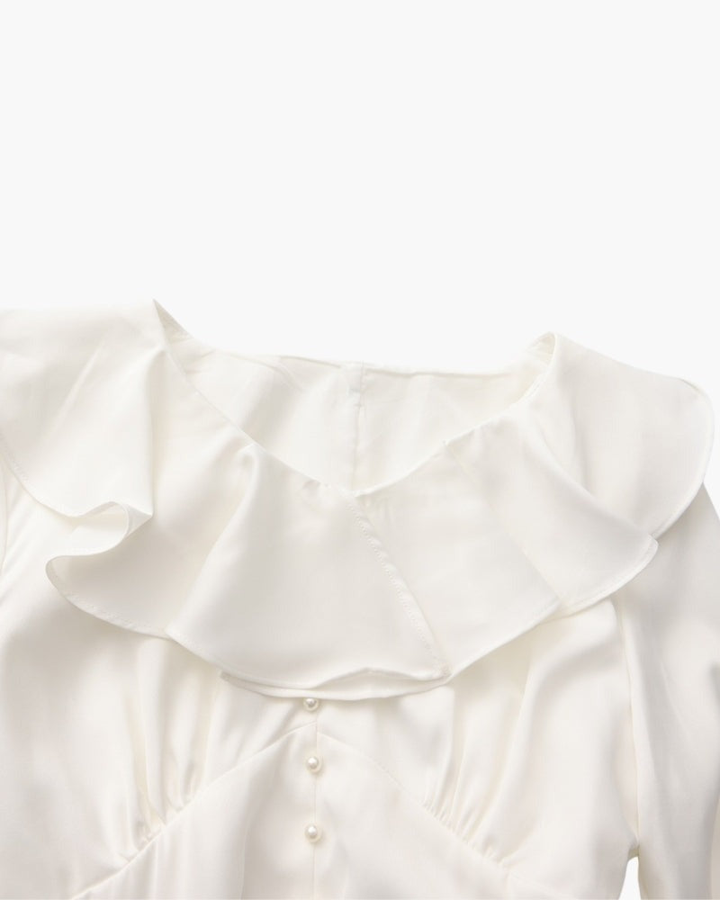 Robe midi à volants et boutons nacrés